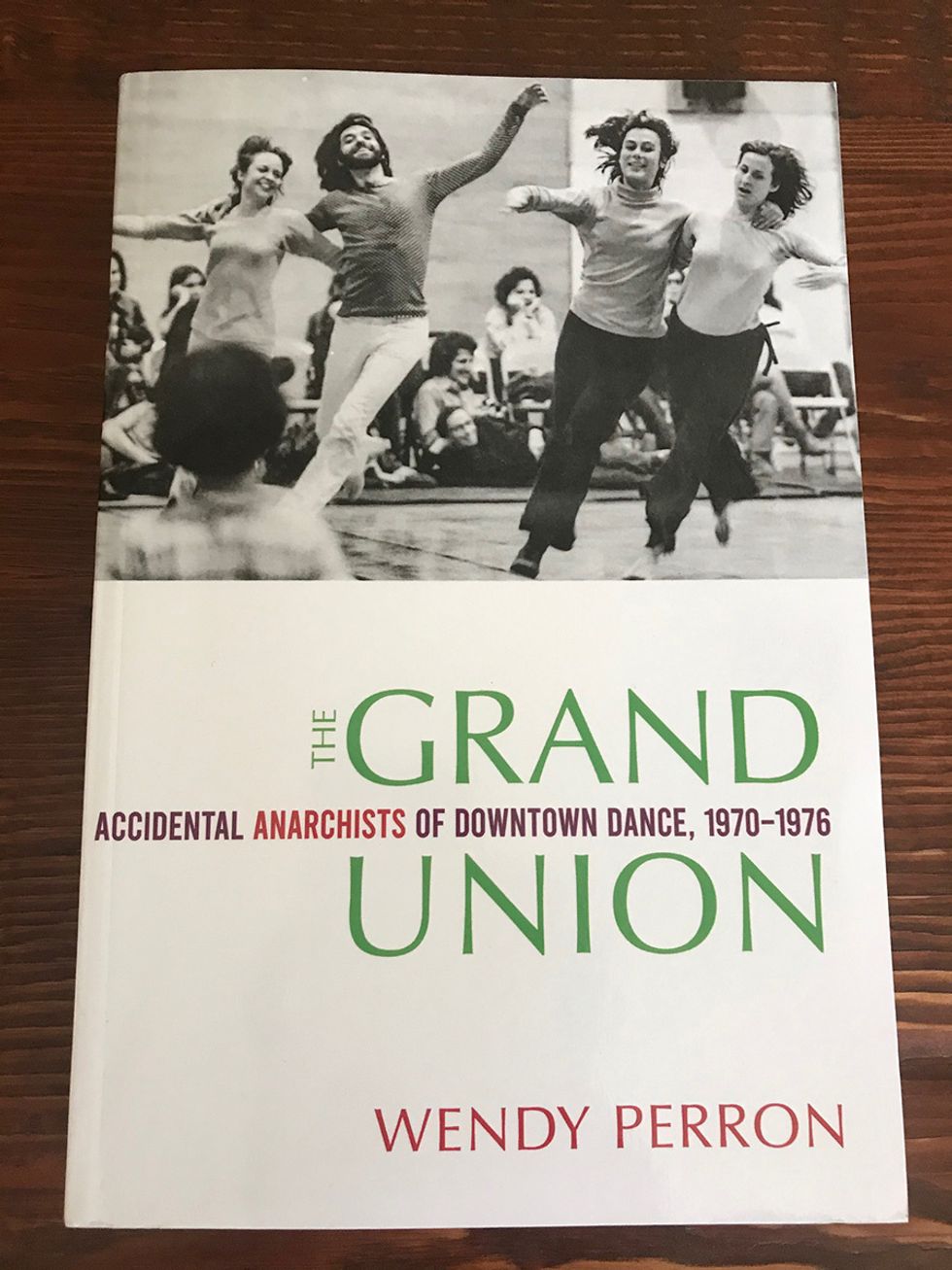 The cover image of Grand Union, featuring a black and white image of dancers at the top and green text on a white background