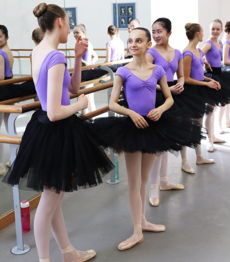 Students at Elmhurst Ballet School wearing their new eco-friendly school uniforms.