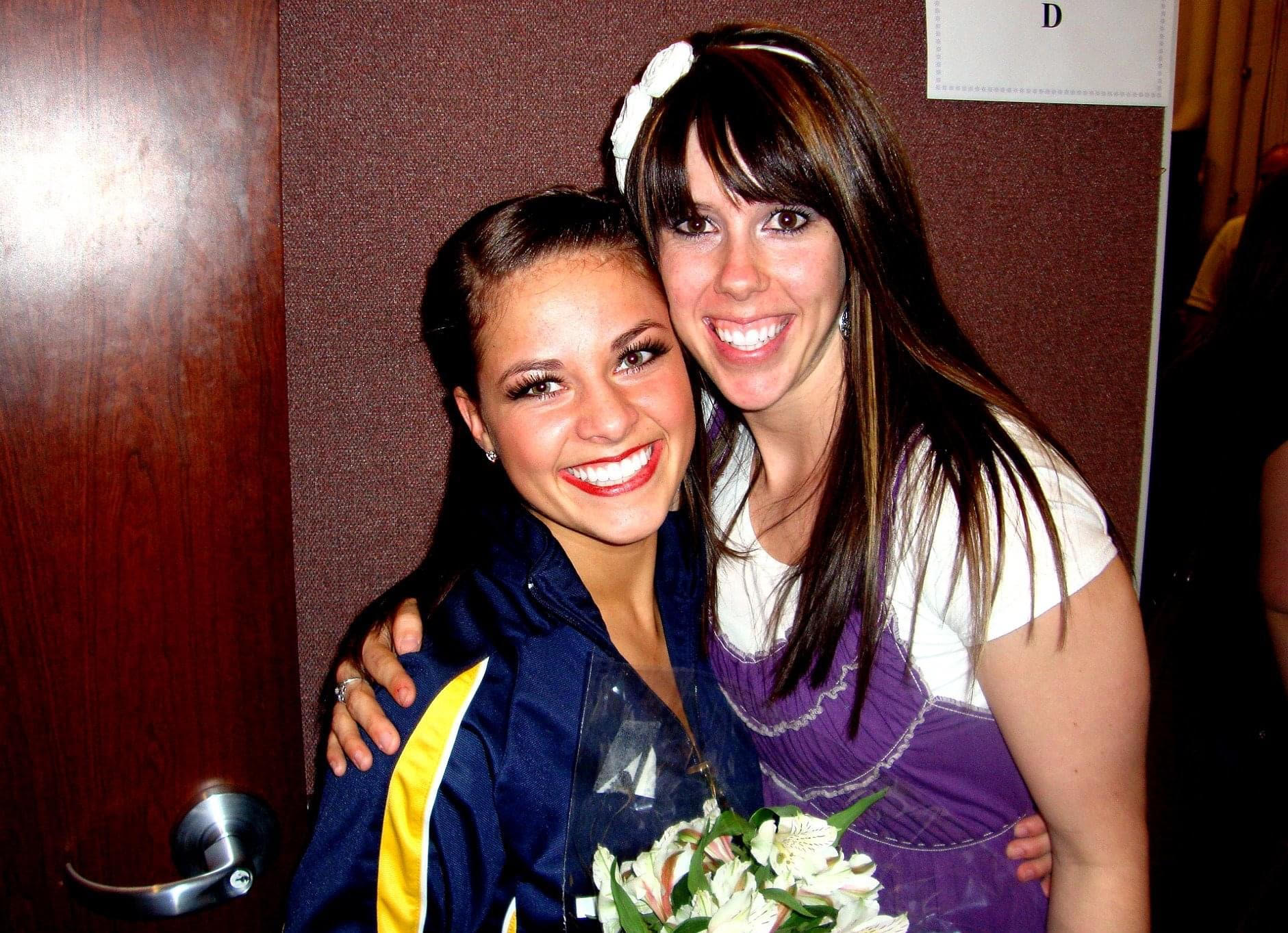 Image of student and dance teacher smiling together