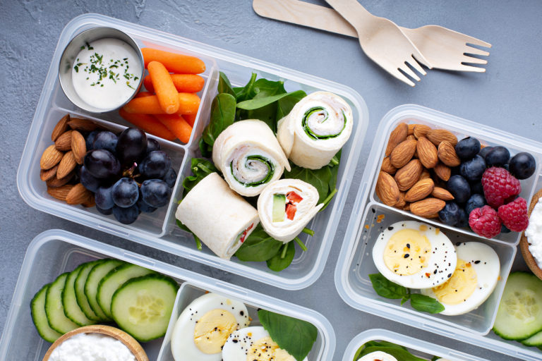 Healthy lunch or snack to go with tortilla wraps, eggs, cottage cheese, fruits and vegetables