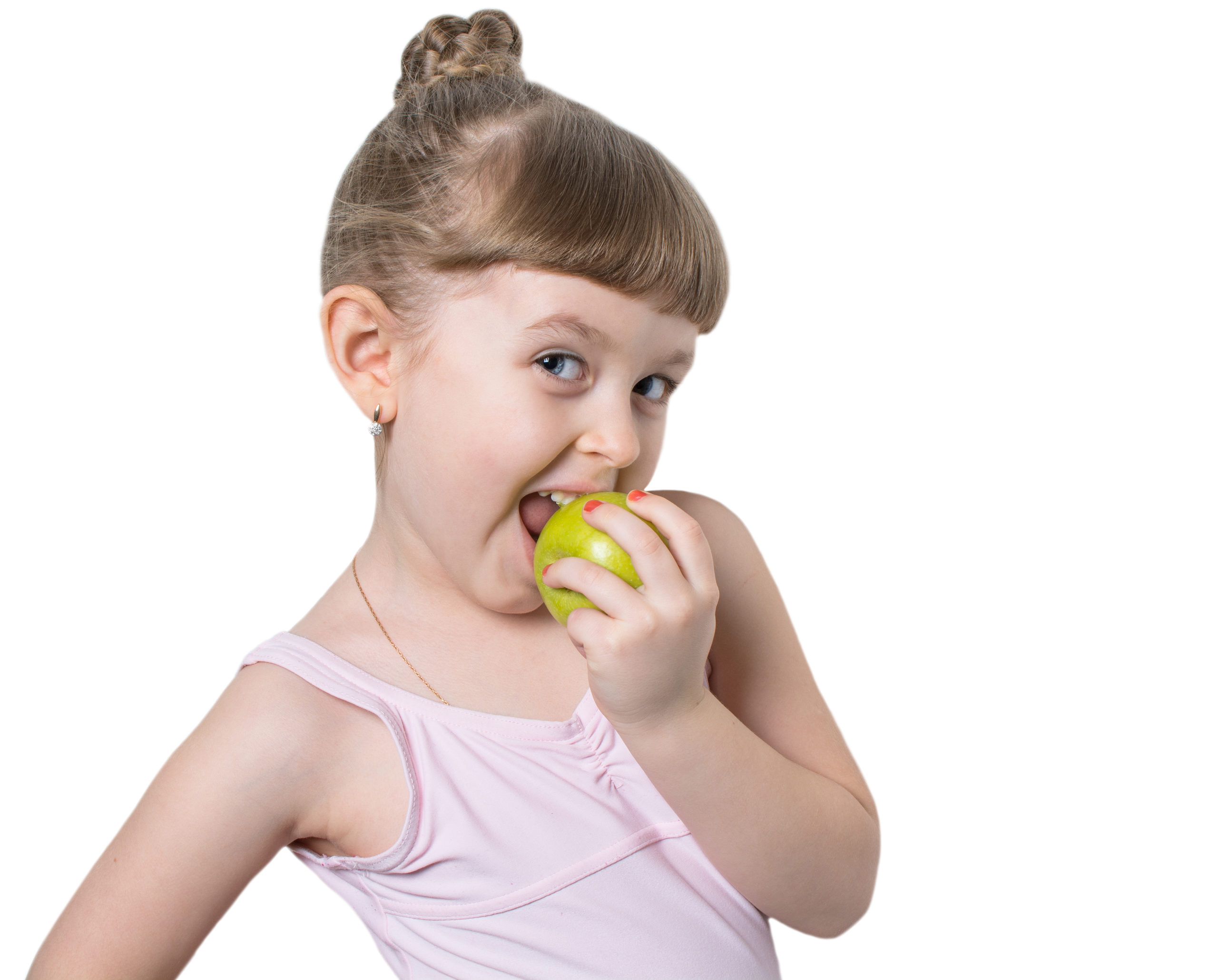 Little ballerina eating a green apple