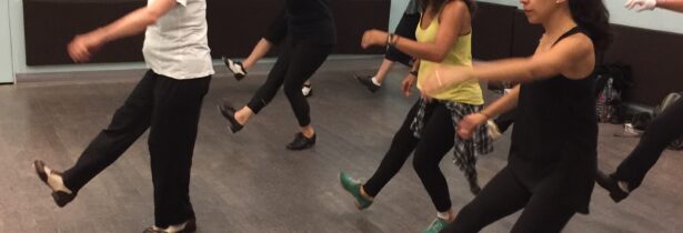 Dance educator Brenda Bufalino teaching a group of tap dance students.