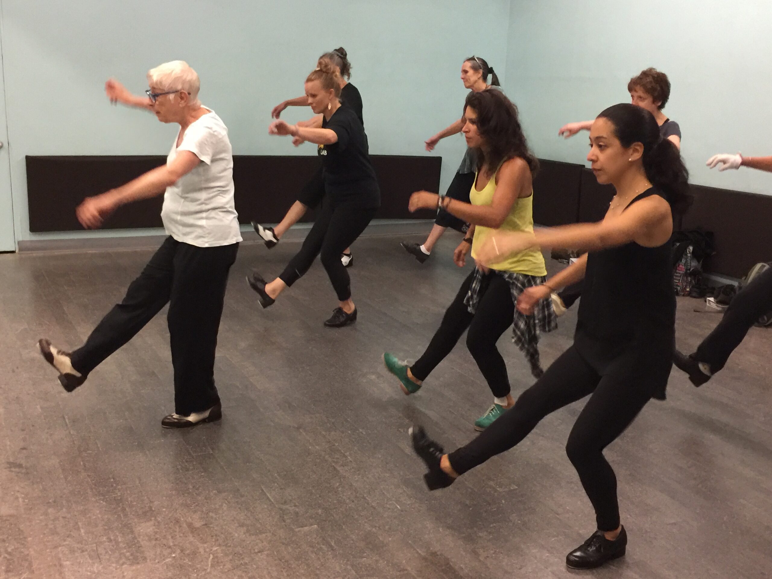 Dance educator Brenda Bufalino teaching a group of tap dance students.