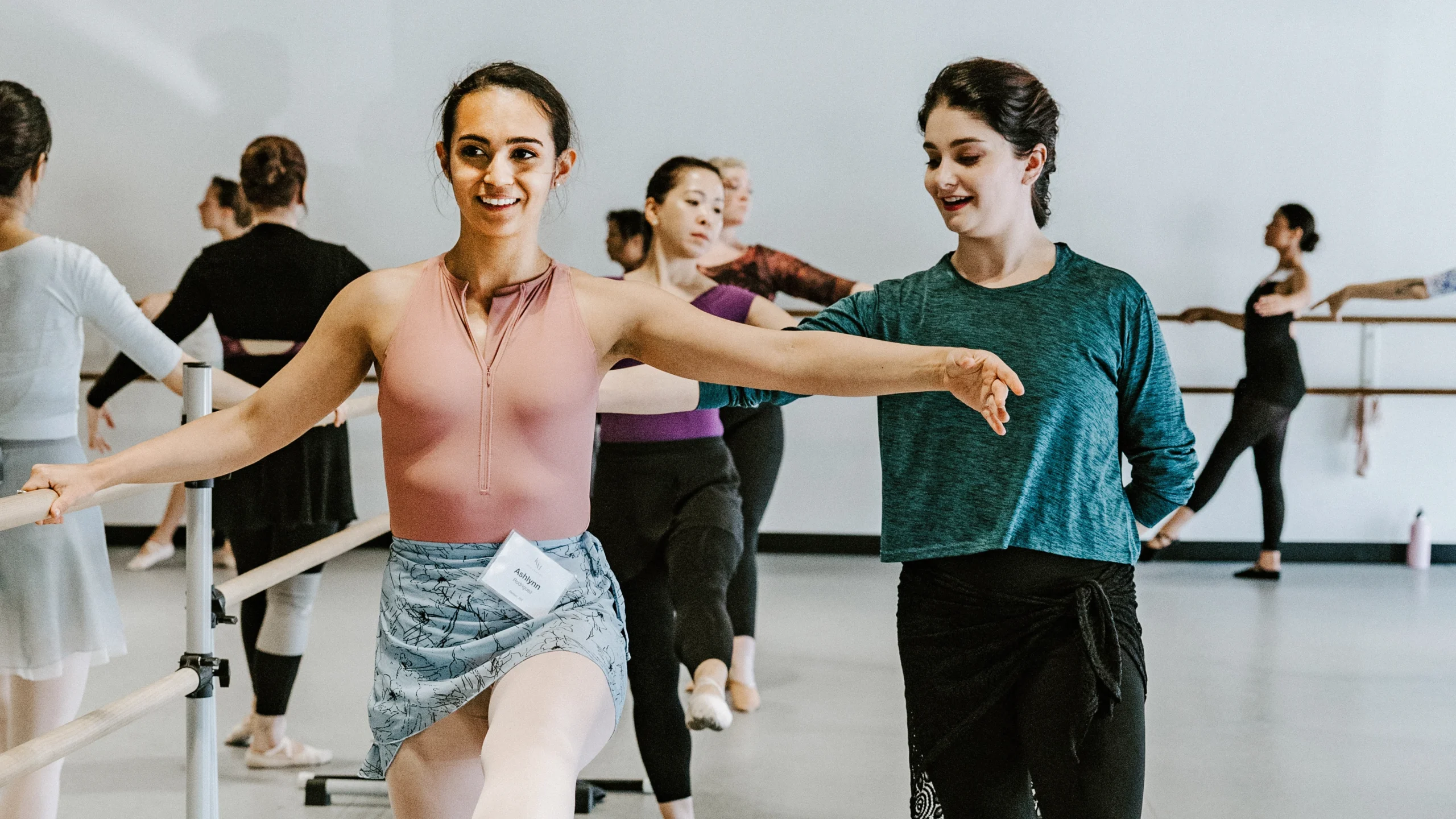 Kathryn Morgan works with a class of adult ballet students.