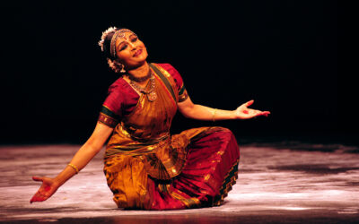 Ranee Ramaswamy performing on stage.
