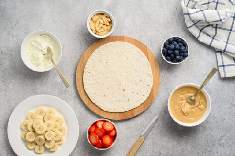 Tortilla cooking process with different fillings of peanut butter, banana, strawberry, blueberry, almond.