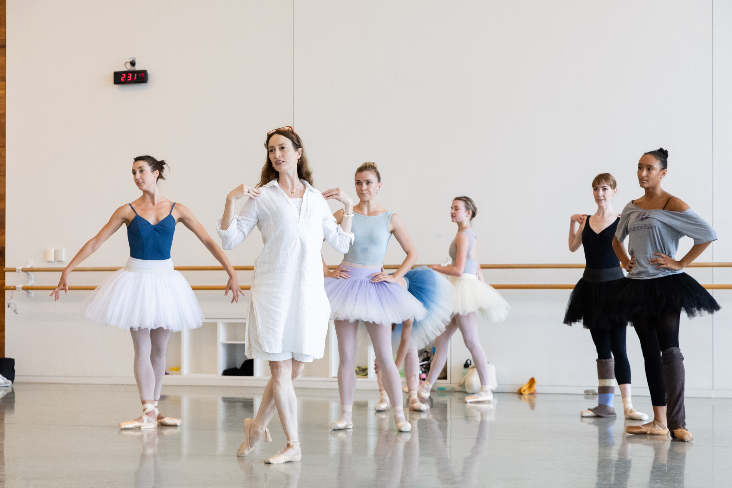 Houston Ballet Artistic Director Julie Kent with Artists of Houston Ballet rehearsing Balanchine’s Stars and Stripes.