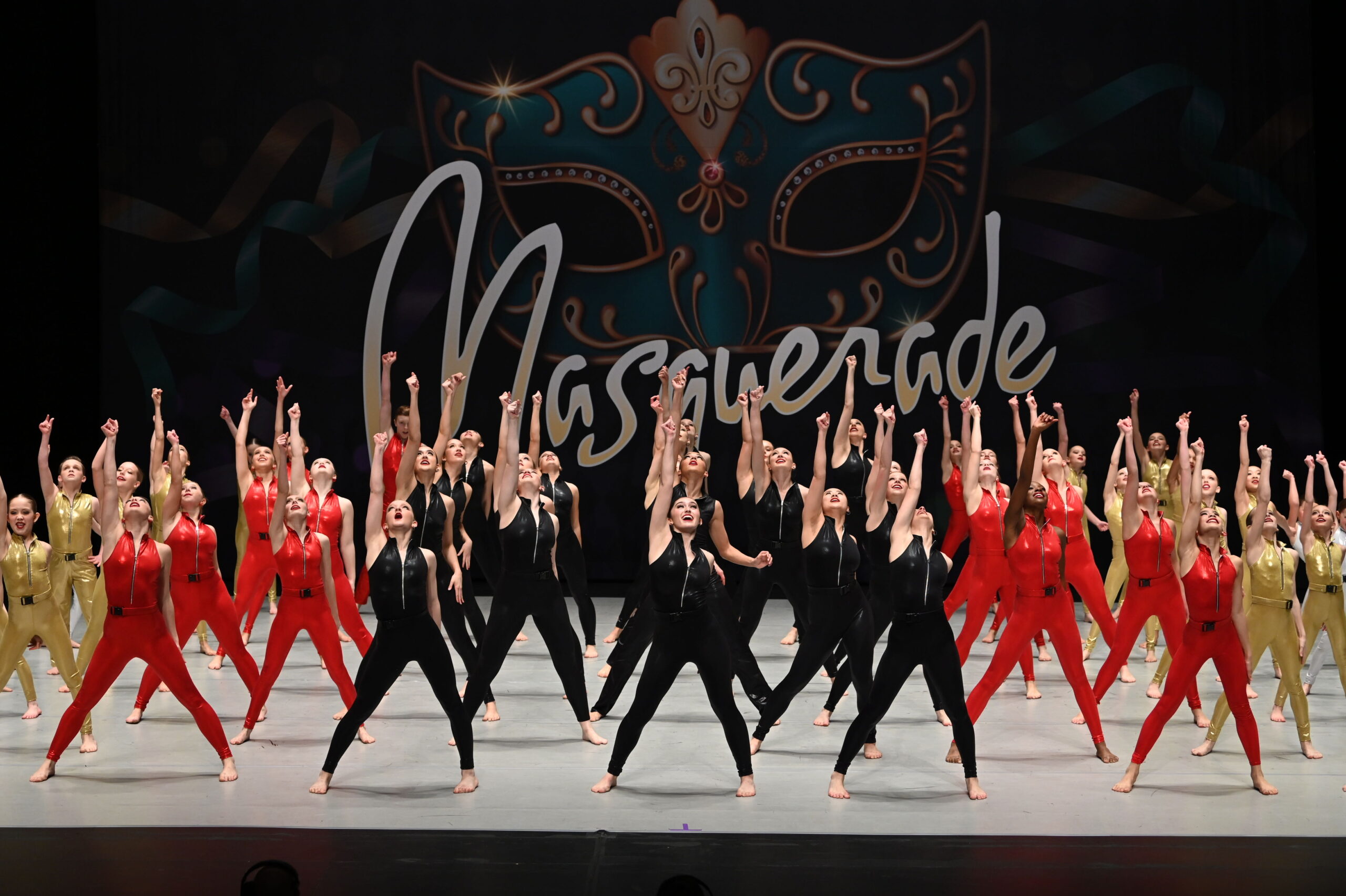 Woodbury Dance Center students performing on stage.