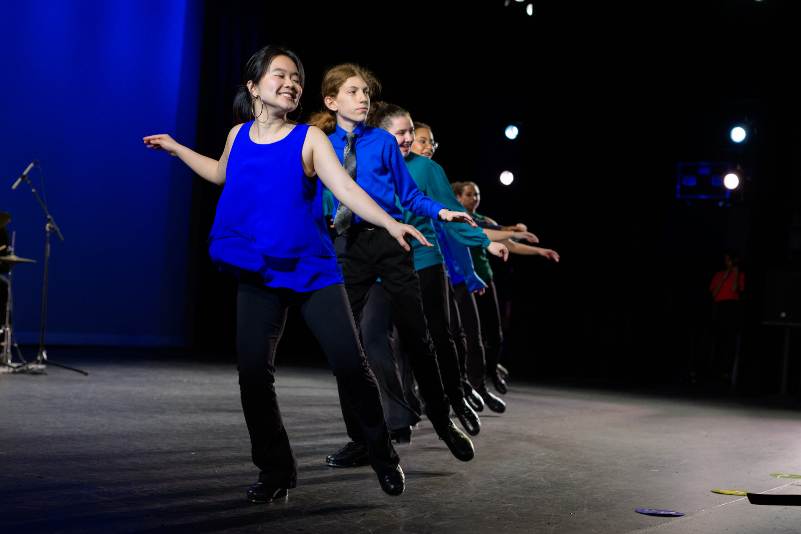 Tap dancers on stage.