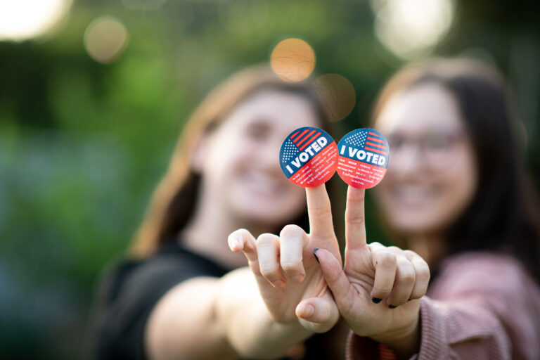 Millennials Wearing the I Voted Stickers