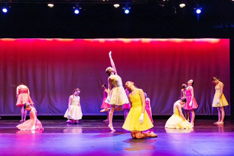 Students from Lake Forest Dance Academy perform on stage.